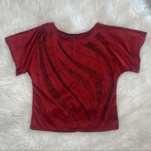 Red blouse with black beaded design